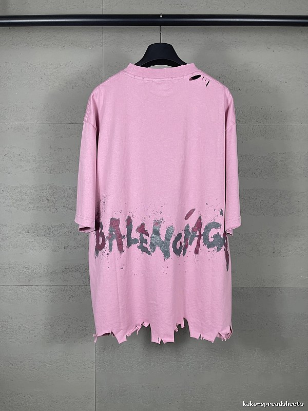 Balenciaga's pink T-shirt with a hole and graffiti style