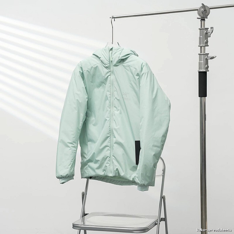 Clean Hooded Profile And Minimal Chest Branding Arc'teryx Lightweight Shell Jacket in Mint Green