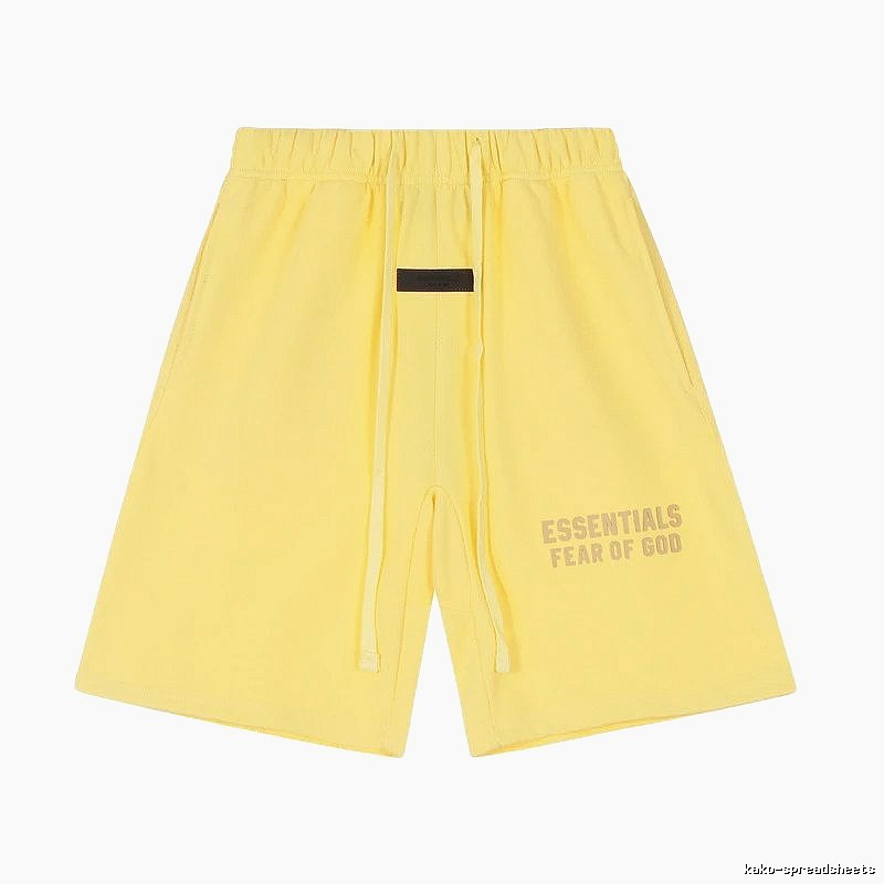 ESSENTIALS minimalist style yellow shorts